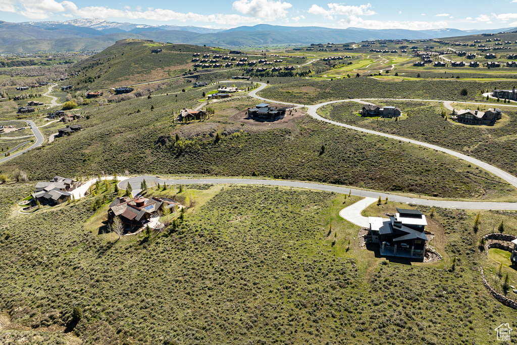 Aerial view of sparsely populated area with mountains