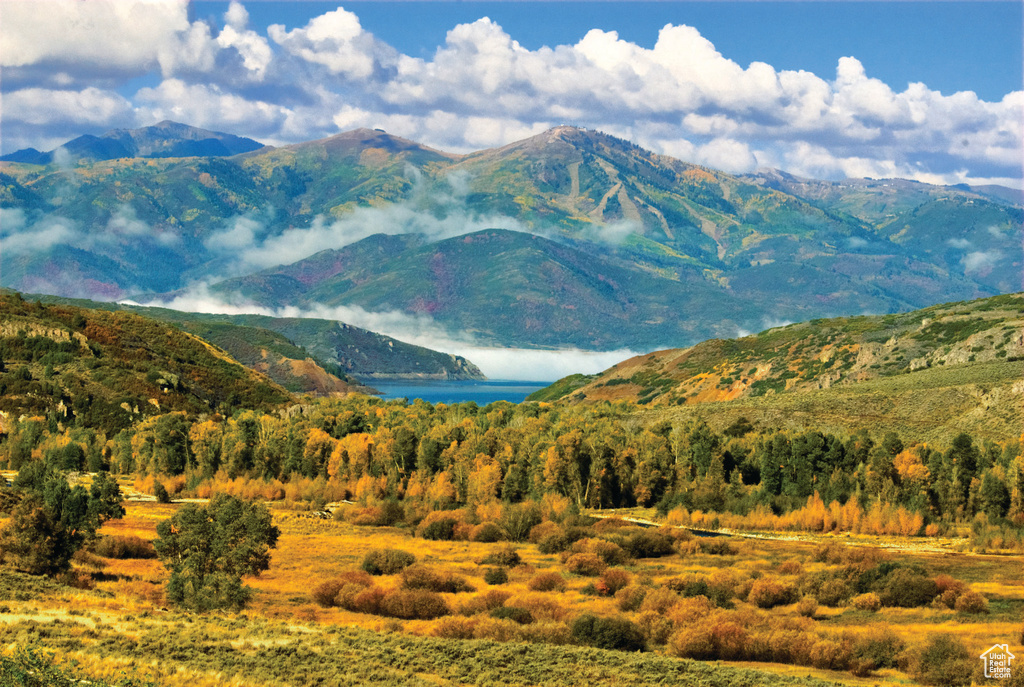 View of mountain backdrop with a large body of water
