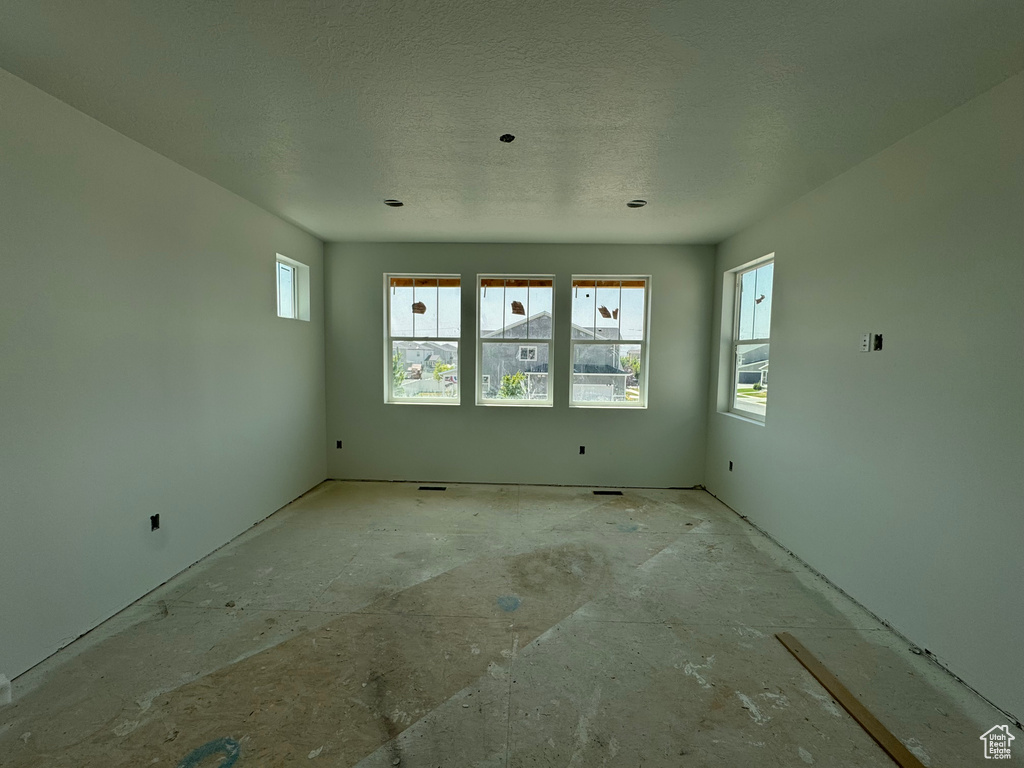 Spare room featuring a textured ceiling