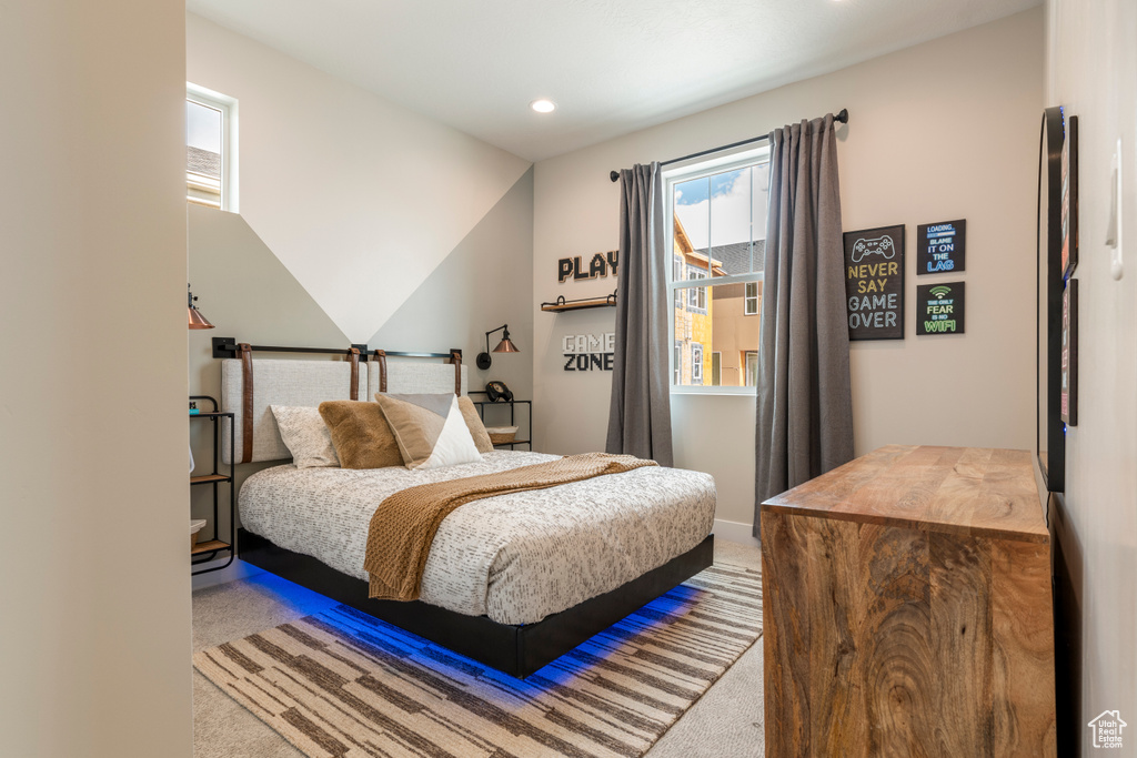 Bedroom with carpet floors, recessed lighting, and baseboards