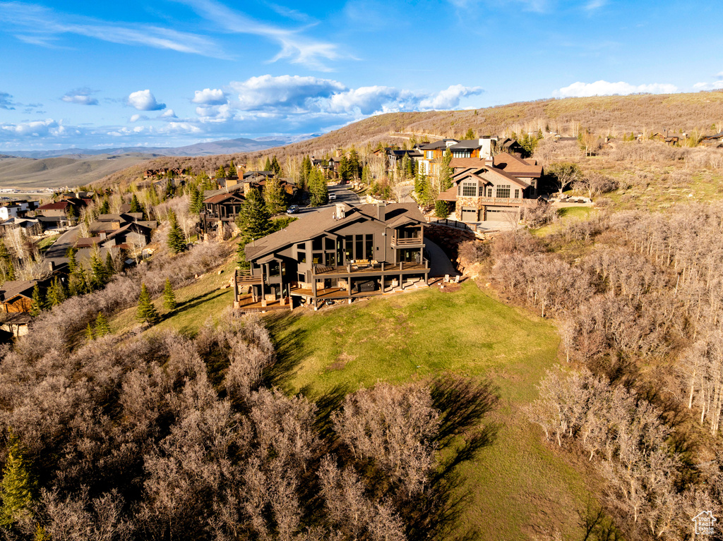 Aerial view of residential area featuring mountains