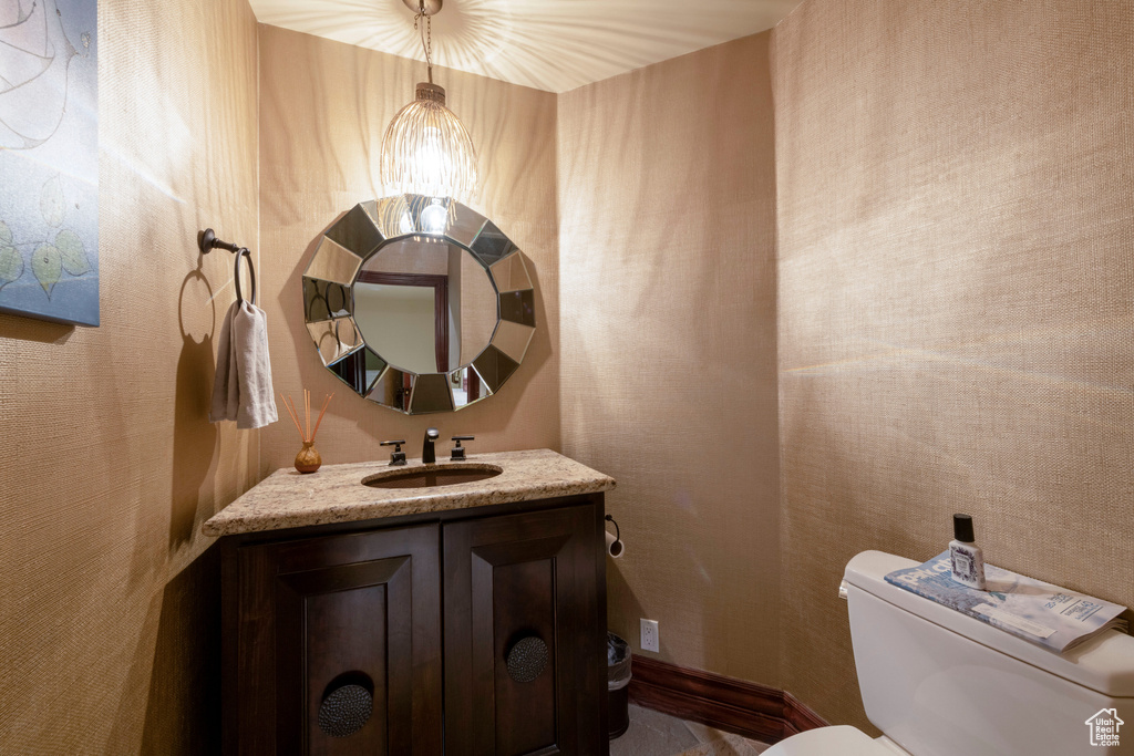 Half bath with toilet and vanity