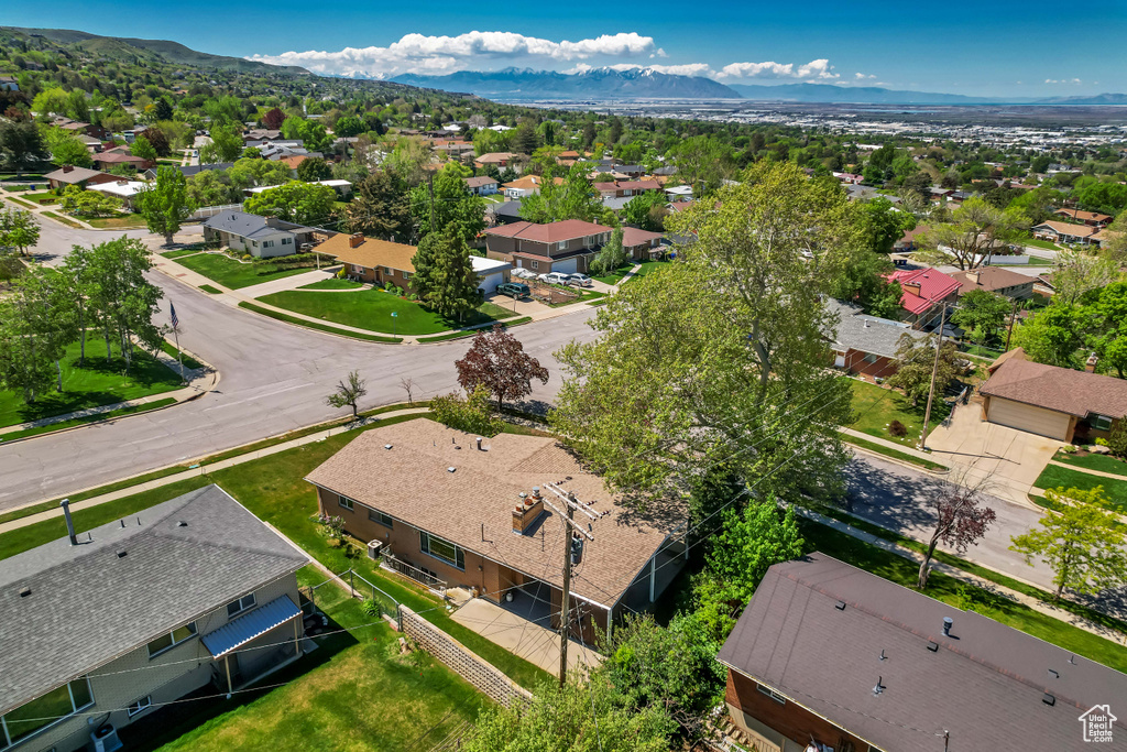 Aerial view of residential area with a mountainous background