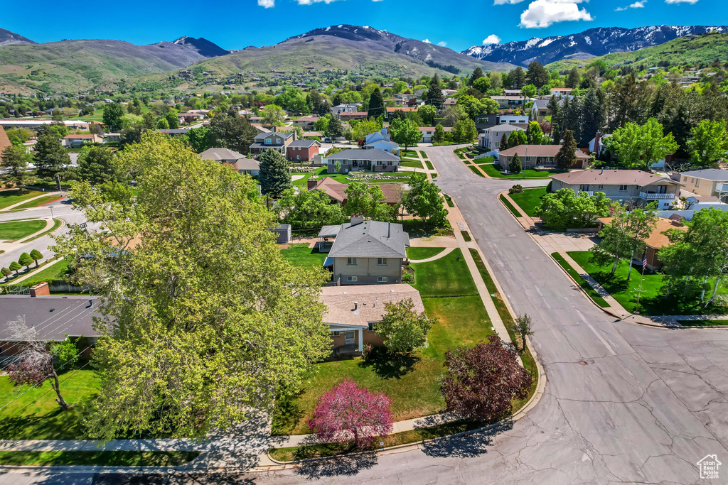 Aerial view of residential area with a mountain backdrop