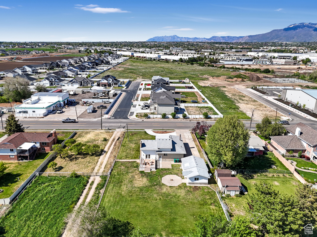 Aerial view of residential area featuring mountains