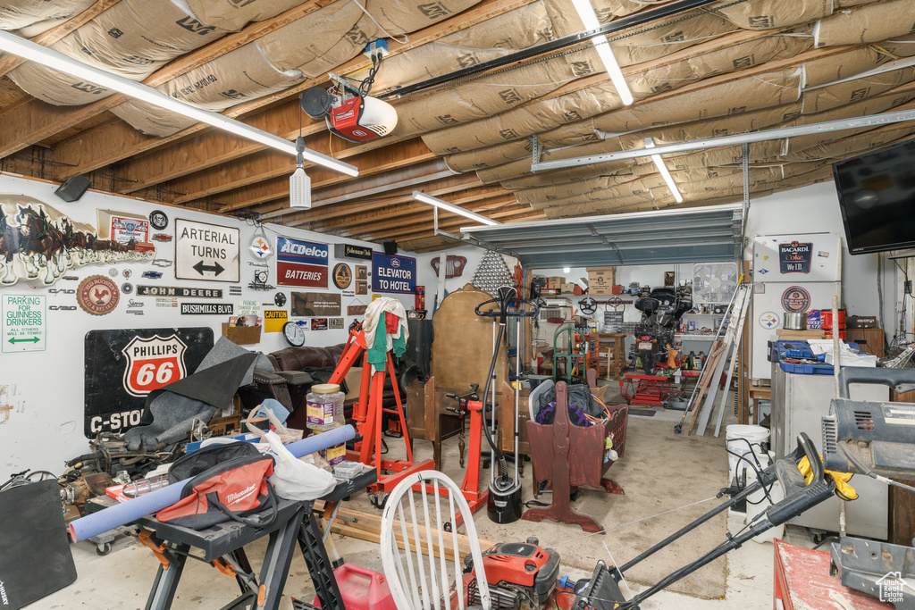 Below grade area with a workshop area and a garage