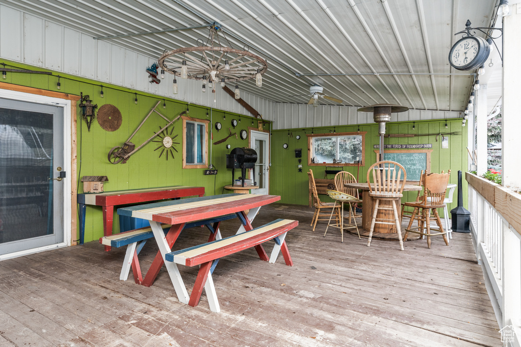 Wooden terrace featuring outdoor dining space
