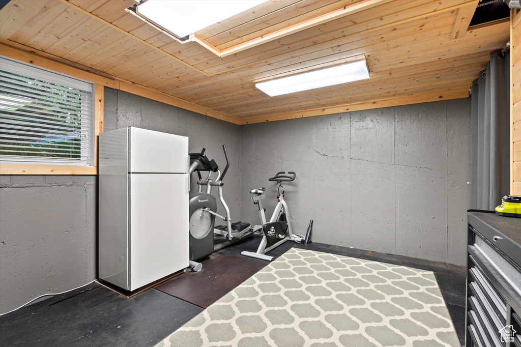 Workout area with wood ceiling
