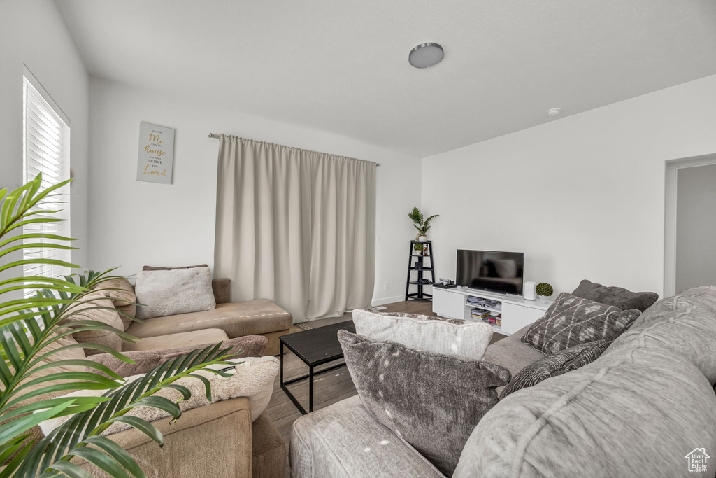 Living room featuring wood finished floors