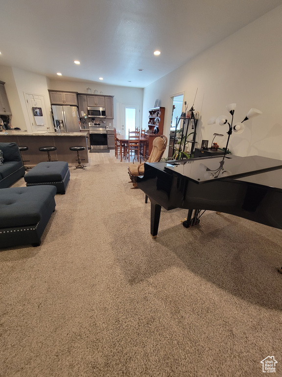 Playroom featuring light colored carpet and recessed lighting