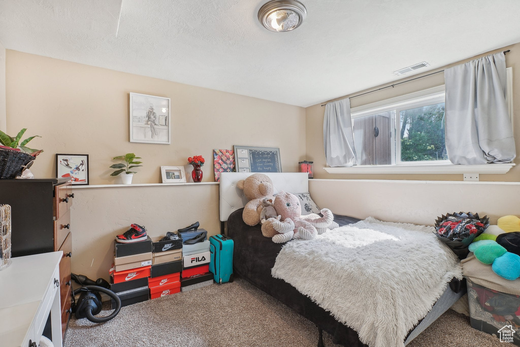 View of carpeted bedroom