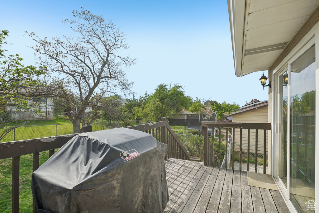 Deck featuring a grill