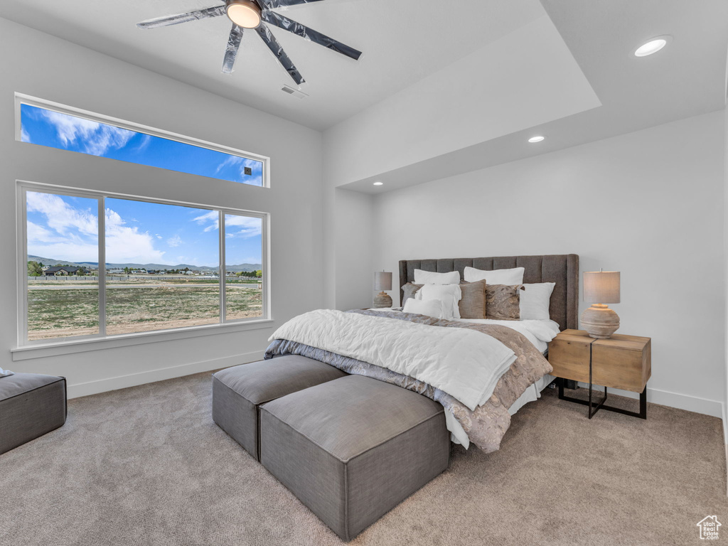 Bedroom featuring carpet, recessed lighting, baseboards, and a ceiling fan