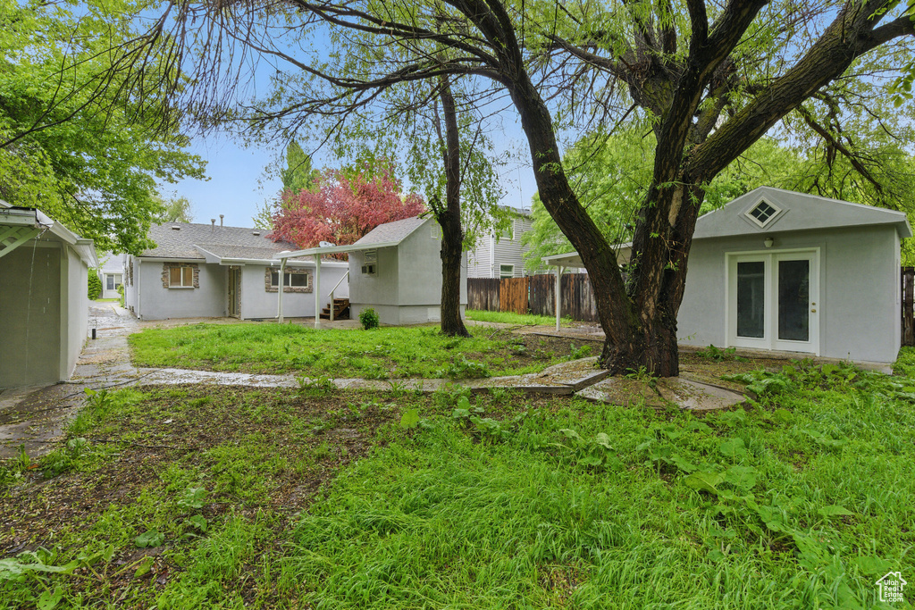 View of yard with fence