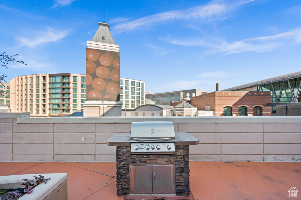 View of patio / terrace with a balcony, area for grilling, and grilling area