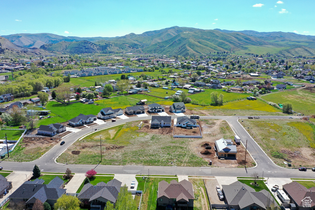 Aerial perspective of suburban area with a mountain backdrop
