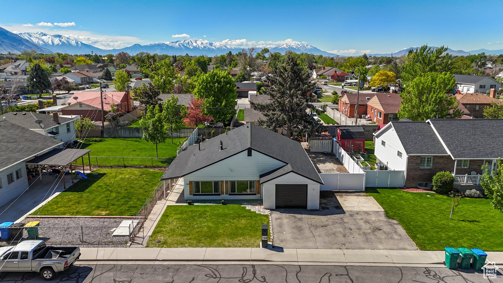 Aerial view of residential area with mountains