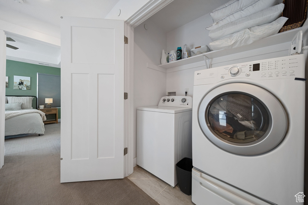 Laundry room with washing machine and dryer