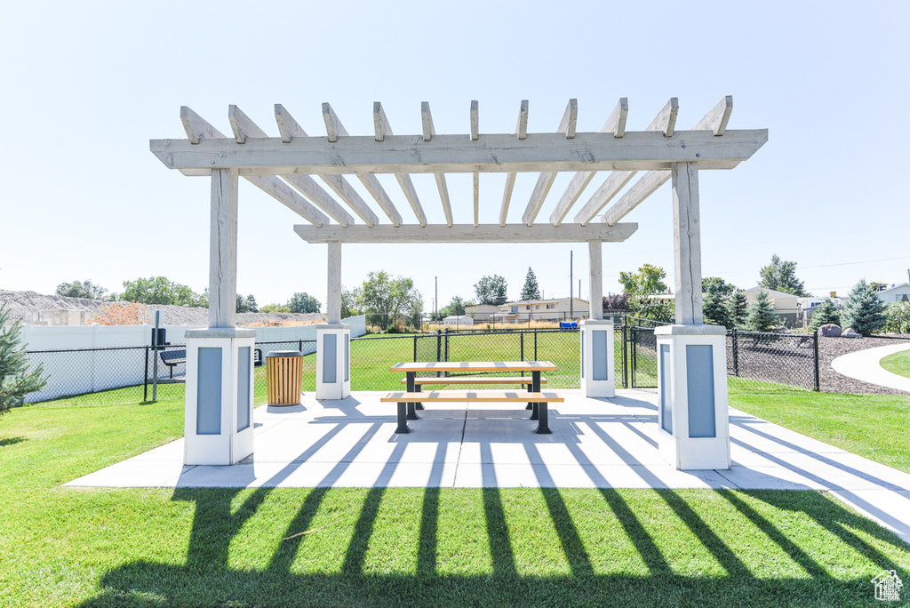 Surrounding community featuring a pergola