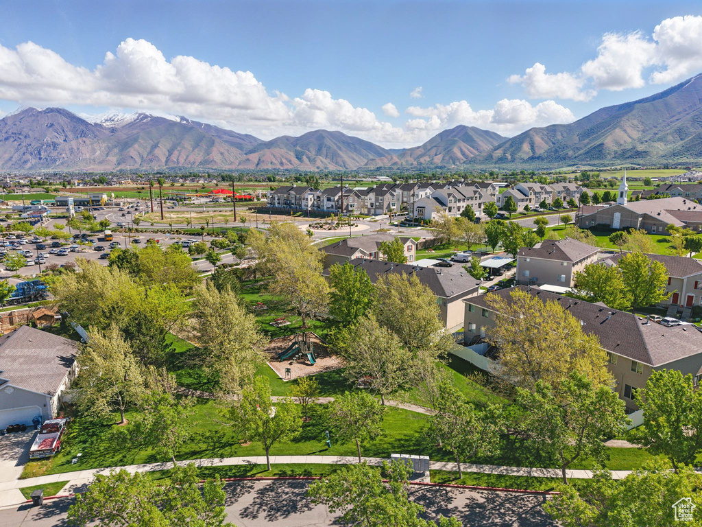Aerial view of residential area with a mountainous background