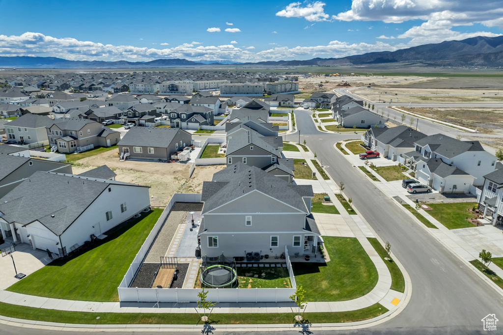 Aerial perspective of suburban area with mountains
