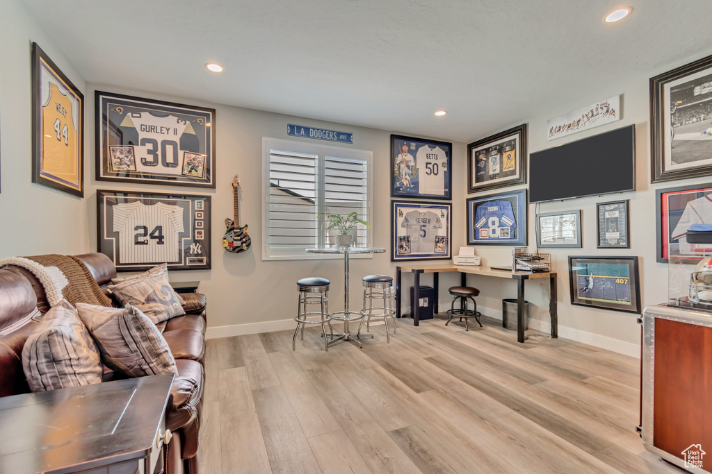 Office area featuring wood finished floors, recessed lighting, and baseboards
