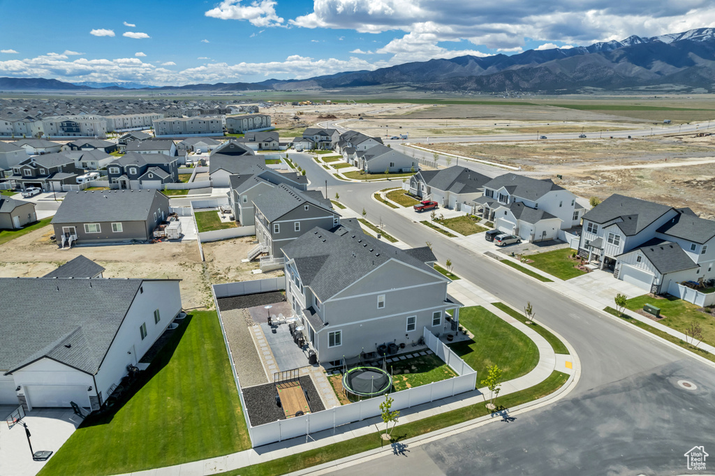 Aerial perspective of suburban area with mountains