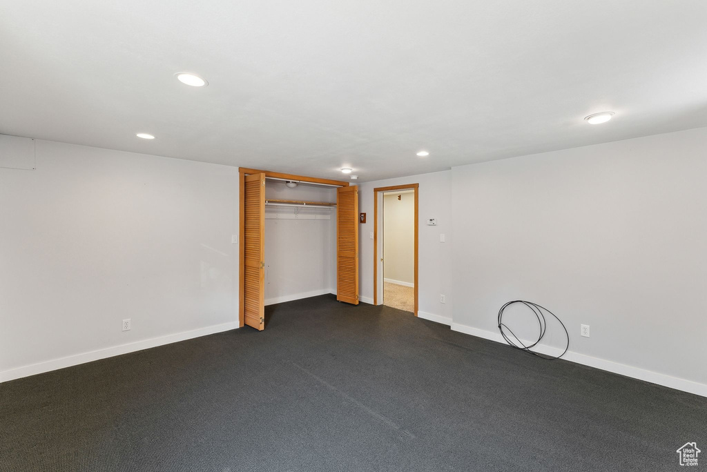 Unfurnished bedroom with recessed lighting, baseboards, and a closet