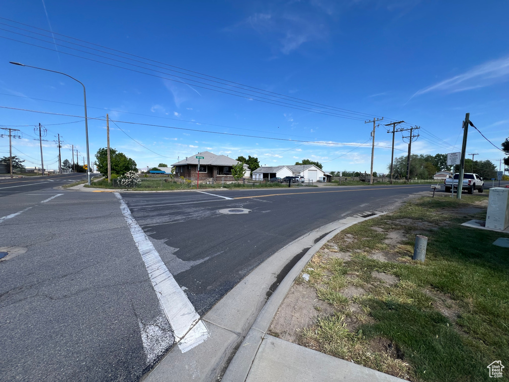 View of asphalt street with street lighting