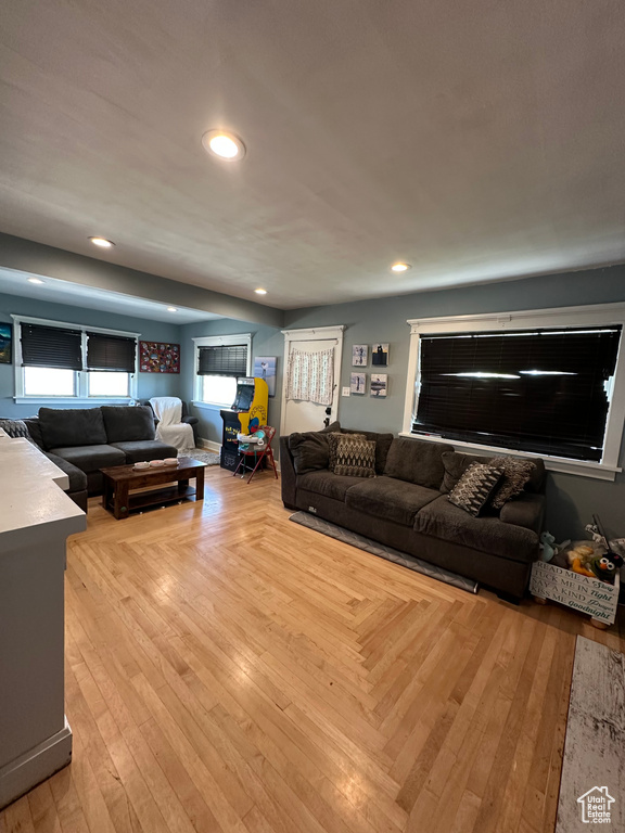Living room featuring recessed lighting and light wood-style floors