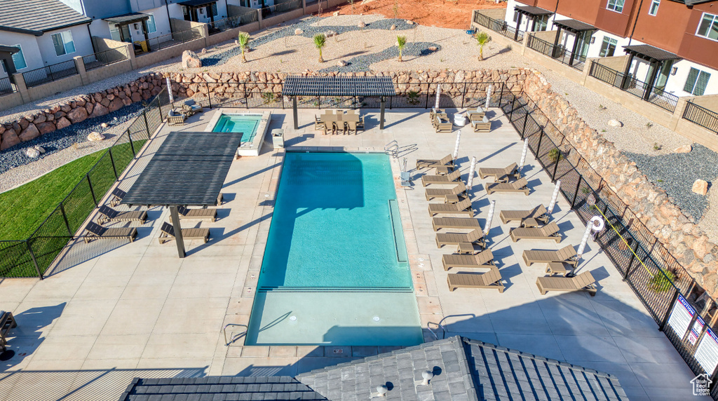 Community pool featuring fence