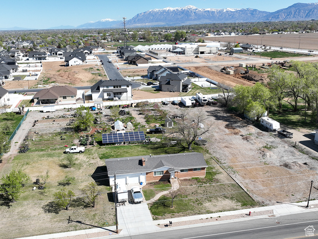 Aerial view of residential area with a mountain backdrop