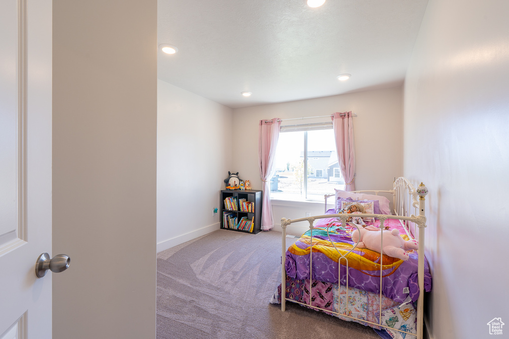 Bedroom with carpet flooring, recessed lighting, and baseboards