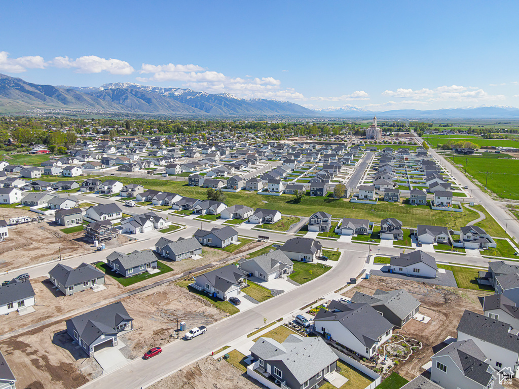 Aerial view of residential area with a mountain backdrop