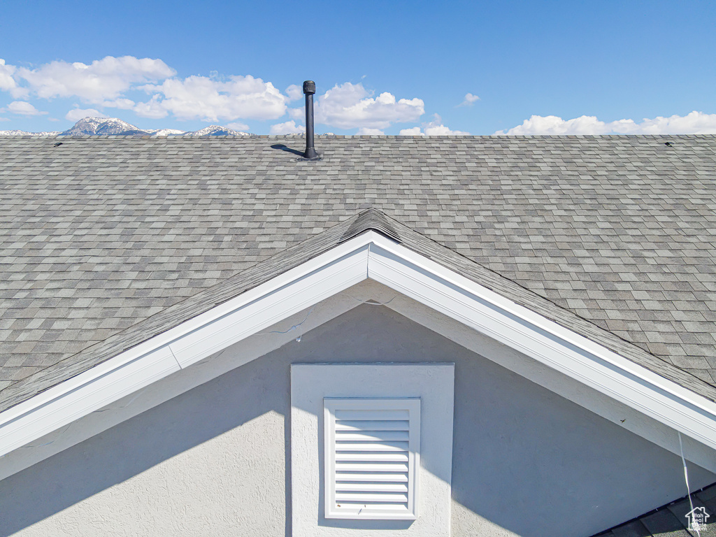 Exterior view of roof with shingles