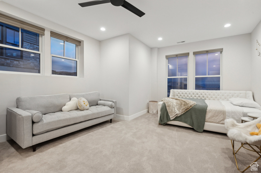 Carpeted bedroom with baseboards, recessed lighting, and a ceiling fan