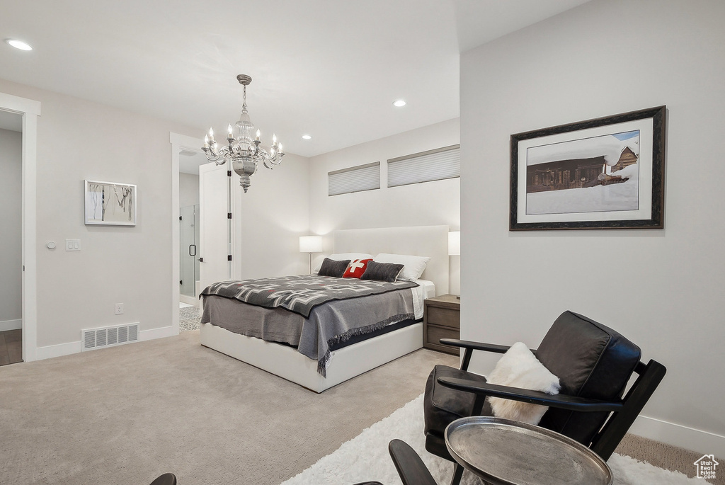 Bedroom featuring a chandelier, light colored carpet, recessed lighting, and baseboards