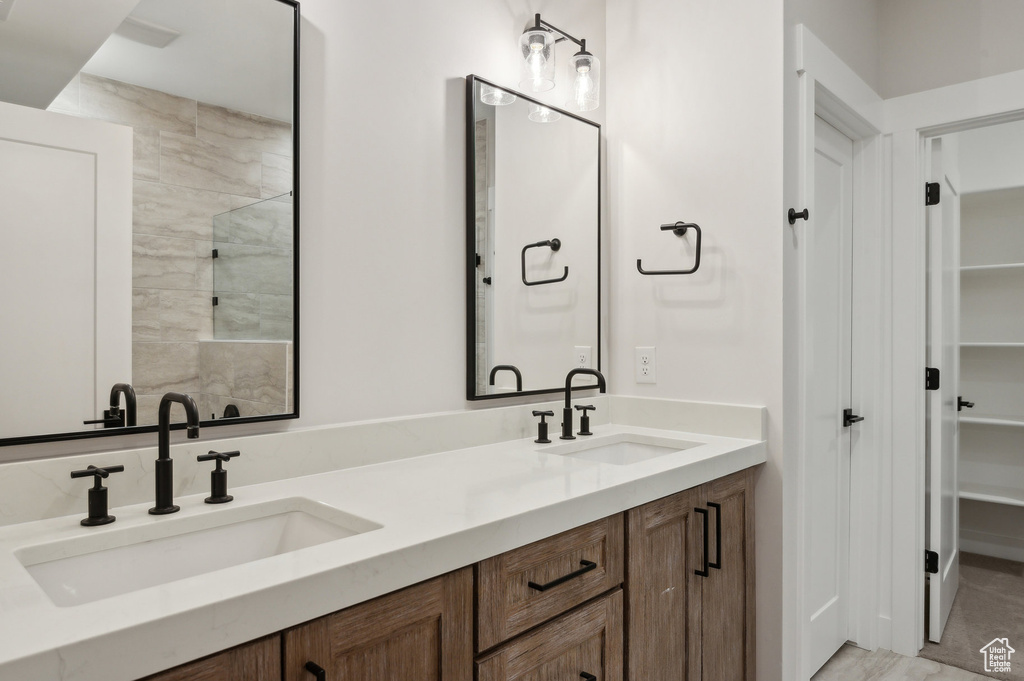 Full bathroom featuring double vanity