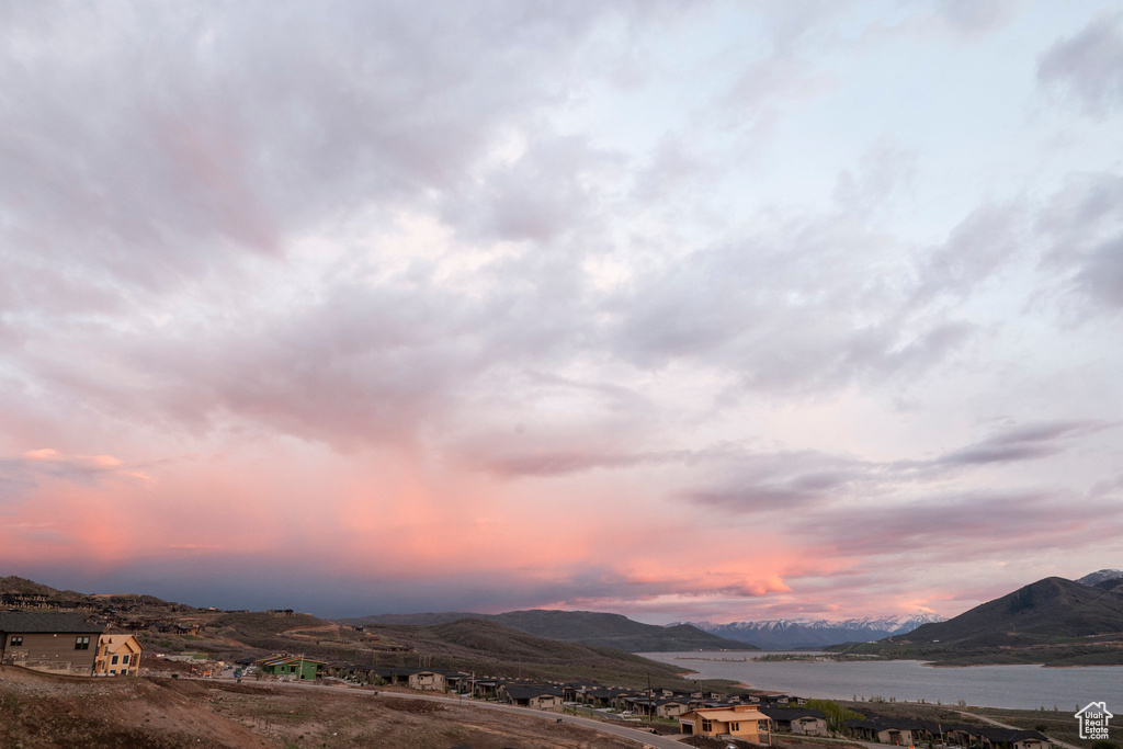 Mountain view featuring a nearby body of water