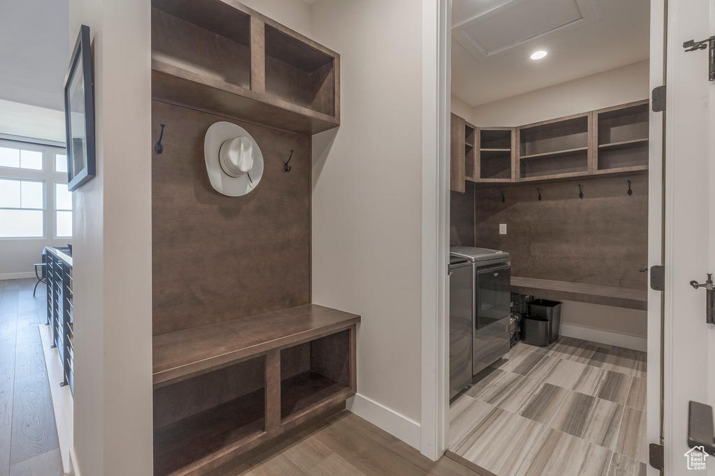 Mudroom with washer and dryer, attic access, baseboards, wood finished floors, and recessed lighting