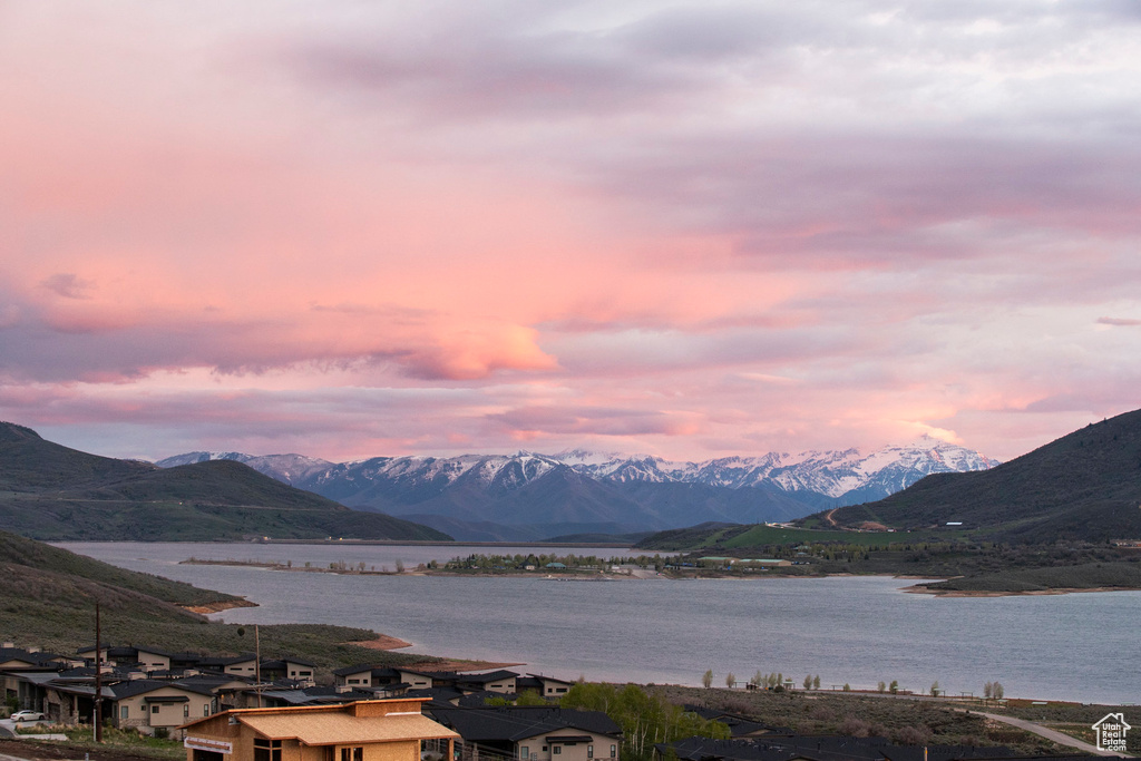 View of mountain backdrop with a large body of water