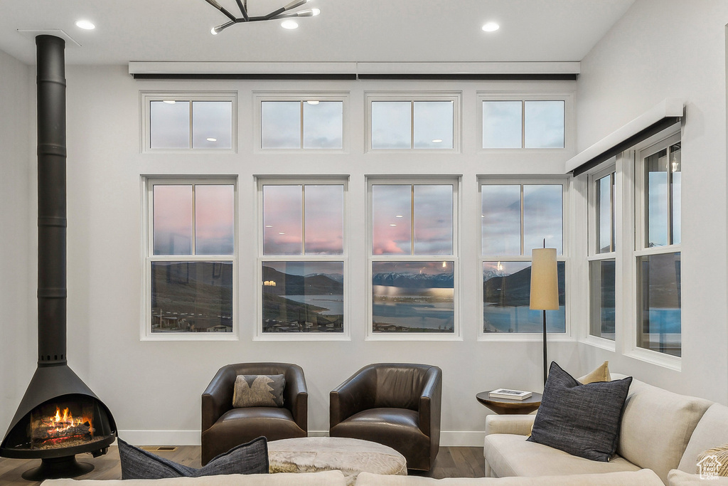 Sunroom / solarium featuring a wood stove
