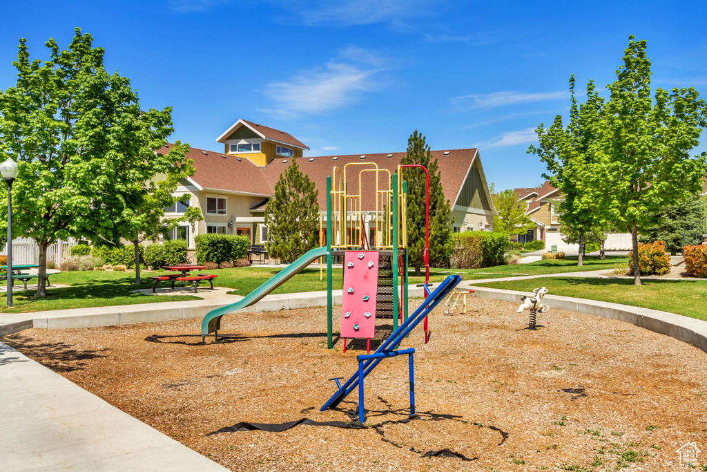 Community playground featuring a yard