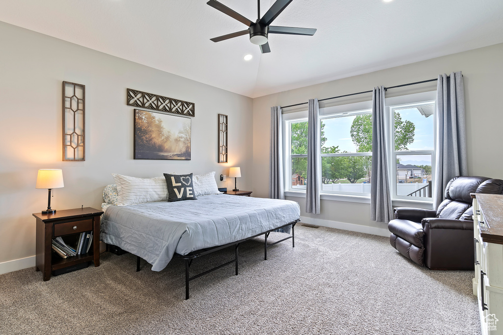 Bedroom featuring baseboards, light colored carpet, a ceiling fan, vaulted ceiling, and recessed lighting