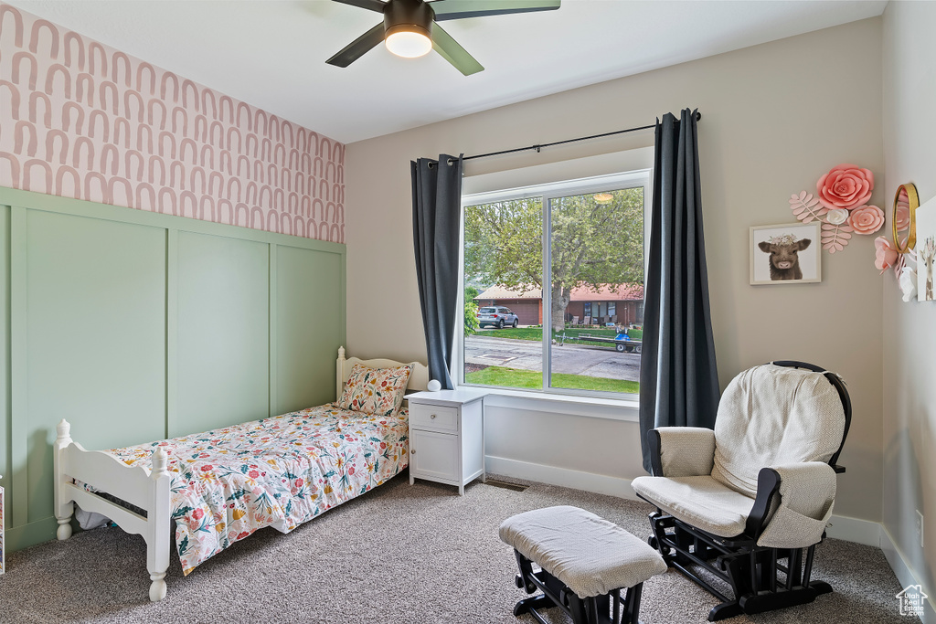 Bedroom with carpet floors and a ceiling fan