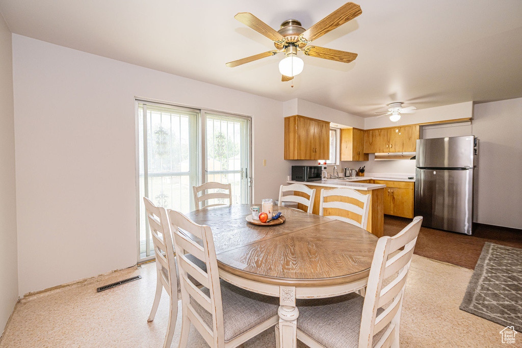 Dining space with ceiling fan