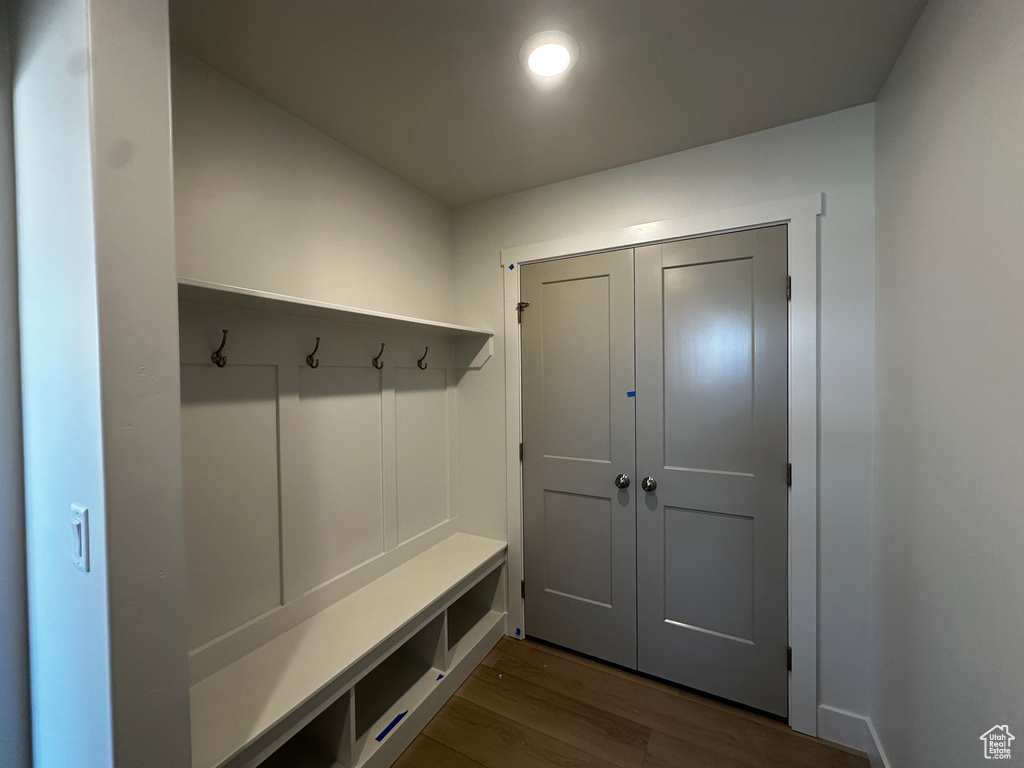 Mudroom with dark wood-type flooring
