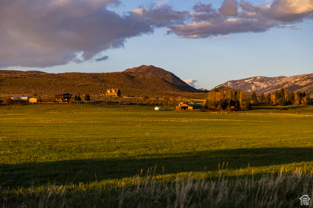 Mountain view featuring rural landscape and a pastoral area