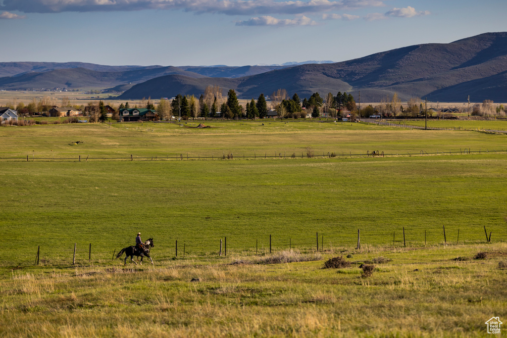 View of mountain background with rural landscape and a pastoral area