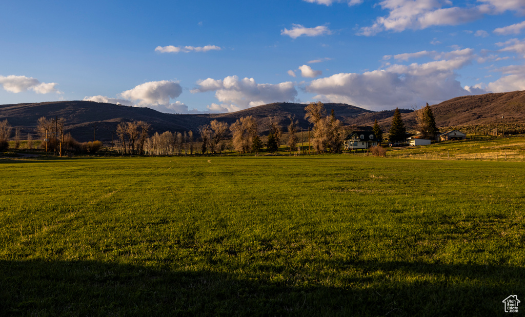 Mountain view featuring rural landscape and a pastoral area